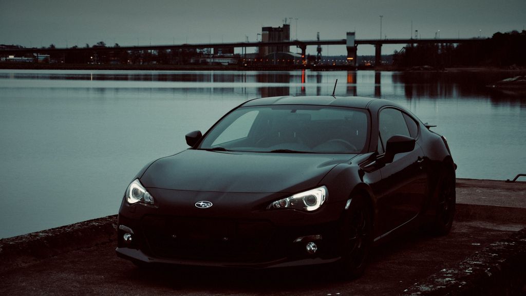 Black Subaru BRZ by the waterfront at dusk — ECU tuning Pickering & Ajax by Wolf Performance