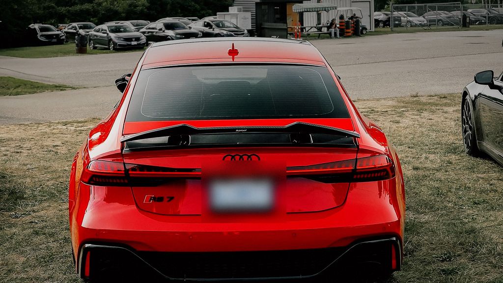 Red Audi RS7 seen from behind